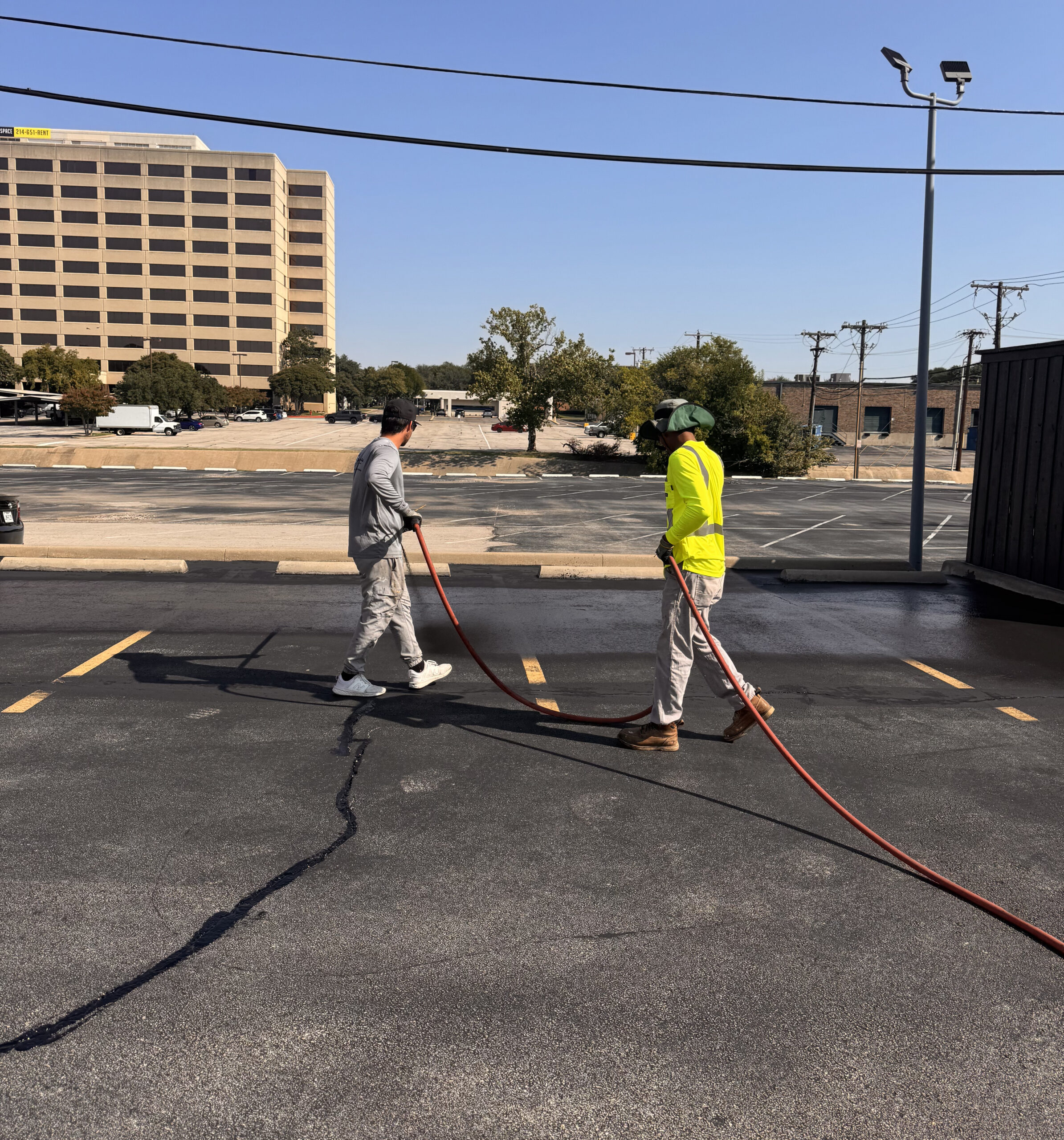 pavement maintenance asphalt sealcoating for parking lots - K5 Services